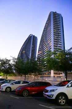 Benidorm, Alicante, Spain- September 11, 2022: Modern architecture buildings called Sunset Waves on the Poniente Beach Area in Benidorm at night