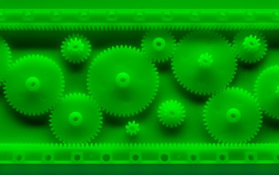 Plastic gears compilation on a green background. Spare parts for your RC toy. Background picture. High quality photo