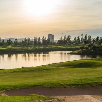 BANNER Orange red dawn sun sky golf pond water reflection hills green fabulous background wallpaper.