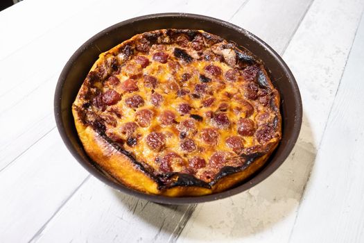 Appetizing cherry clafoutis made at home in the old fashioned way in France.