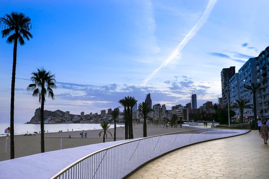 Benidorm, Alicante, Spain- September 11, 2022: Poniente beach with its beautiful promenade with access to the beach and viewpoint with modern design