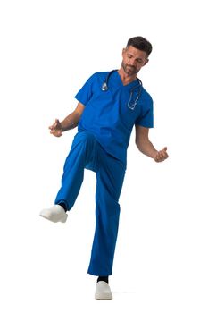 Young male medical nurse healthcare worker holding fists up isolated on white background full length studio portrait