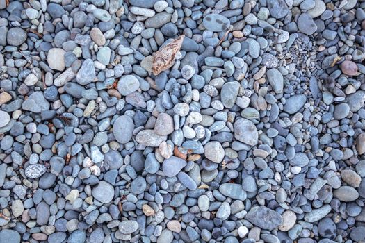 Stones pattern. Decorative white grey blue stones, round stones background , Stones or Gravel for building, floor or wall. Pebbles Texture