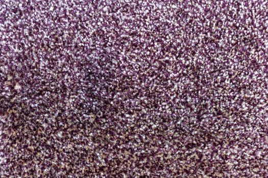 Brown shade carpet texture background closeup view