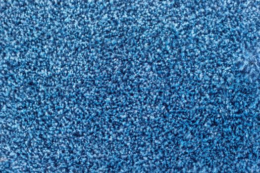 Blue carpet texture background closeup