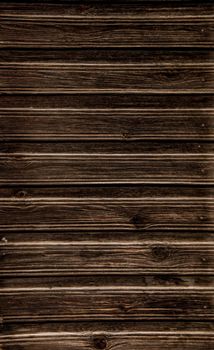 Natural brown barn wood floor / wall texture background pattern. Wood planks / boards are very old with a beautiful rustic look / style.