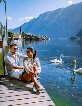 Hallstatt Austria, couple visit Hallstatt during summer vacation Hallstatter lake.