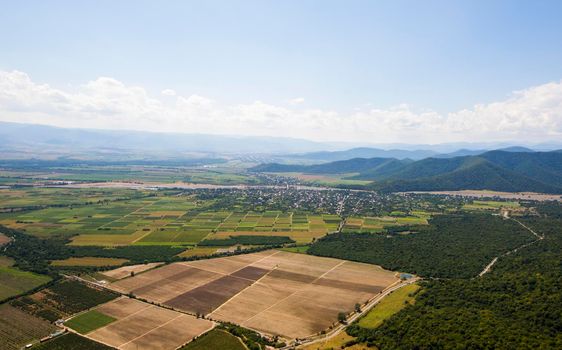 High angle view of agricultural fields in Kakheti, Georgia. Fields and sky