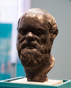 Berlin, Germany - 18 September 2019: Old bust of Socrates head in Berlin Altes museum. Ancient sculpture figure at exibition in Germany closeup