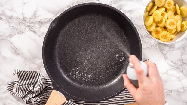 Flat lay. Step by step. Frying mini pancake cereal in a nonstick frying pan.