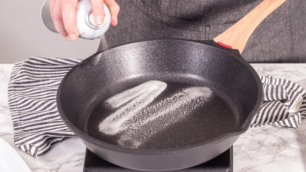 Step by step. Frying mini pancake cereal in a nonstick frying pan.