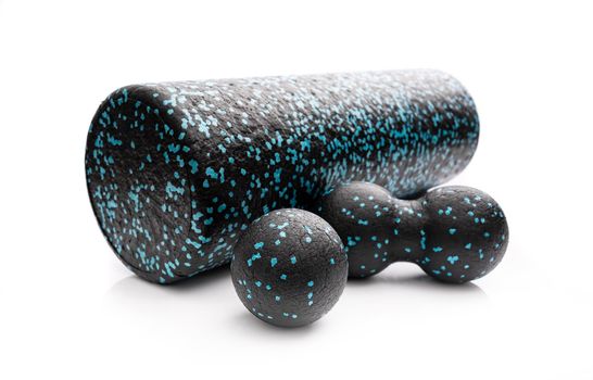 Massage therapy balls and roll for muscle relaxation after training or injury. Medical equipment for body recovery