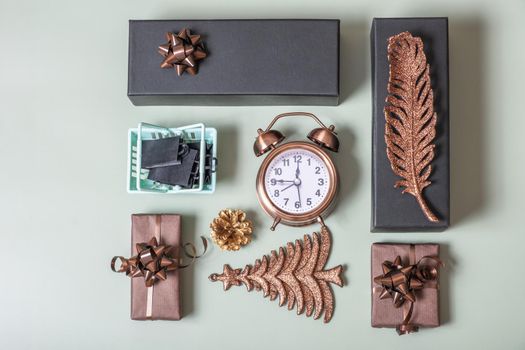 Christmas New Year shopping flatlay with gifts and holiday decor top view. Creative modern layout.