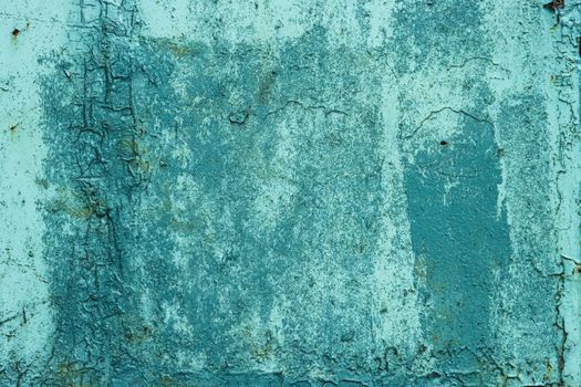 Green aquamarine turquoise azure plaster wall abstract pattern texture coarse surface background rough stucco.