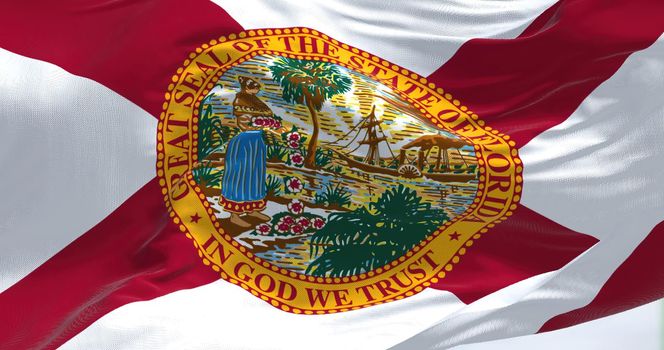 Close-up view of the Florida state flag waving. Florida is a state located in the Southeastern region of the United States. Fabric textured background