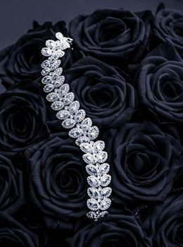 Luxe branding, glamour fashion and boutique shopping concept - Luxury diamond jewelry bracelet and black roses flowers, love gift on Valentines Day and jewellery brand holiday background design