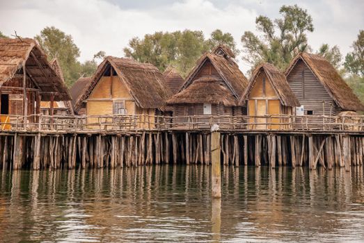 A natural view of stilt houses over the Lake Unteruhldingen in Bodensee, Germany