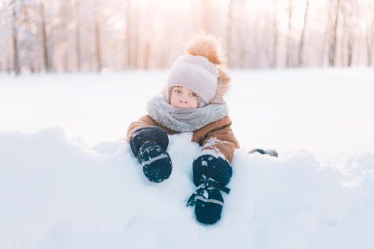 Winter portrait of a boy lifestyle . Winter. An article about children walking in the cold. Winter Games. Winter walks