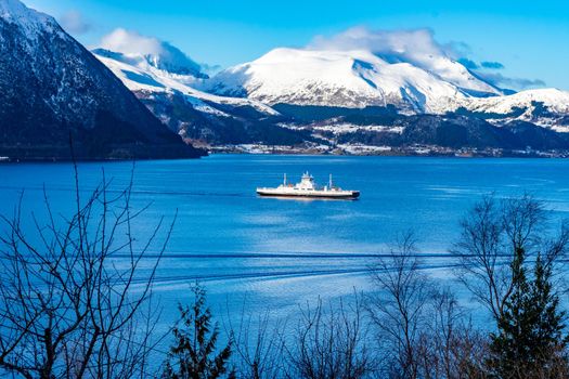 A breathtaking view of arctic mountains and fjord in Volda, Norway