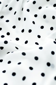 Fashion design, interior decor and vintage material concept - Classic polka dot textile background texture, black dots on white luxury fabric design pattern