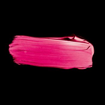 Art abstract, cosmetic product and hand painted design concept - Pink lipstick brush stroke texture isolated on black background