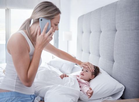 Phone call, sick and child in bed with mother feeling for fever with hand on forehead with worry, care and love. .Family, medical and stress with mom checking health on baby girls head for virus.