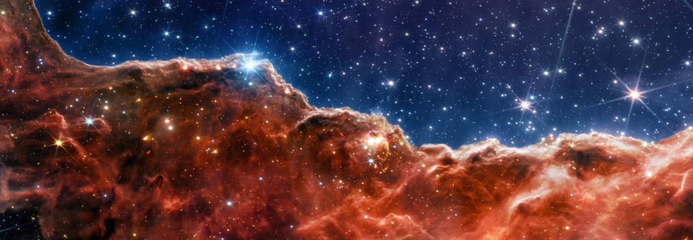 Carina Nebula. Star-forming region in the deep space. Gas accumulations in outer space. James webb telescope research of galaxies. Space landscape. JWST. Elements of this image furnished by NASA.