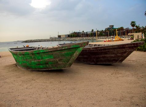 Boats on the La Mer beach in Jumeirah area, Dubai, UAE. Outdoors