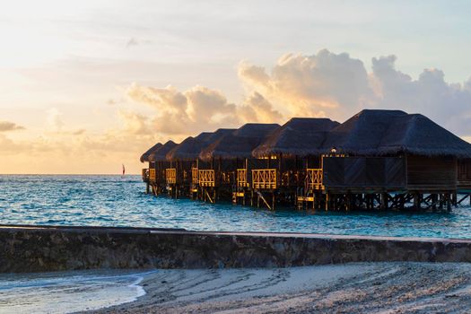 Shot of a over water bungalows on tropical island