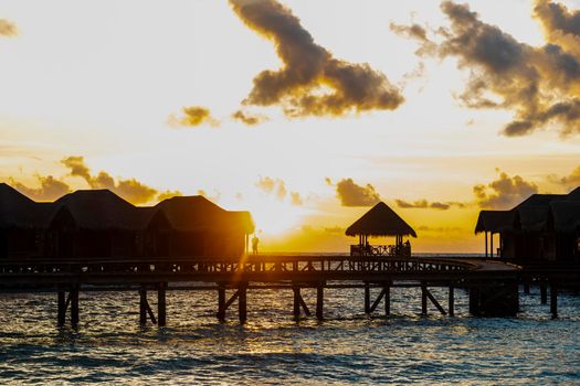 Shot of a over water bungalows on tropical island