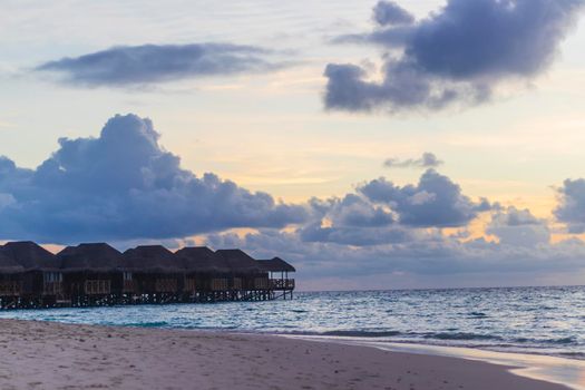 Shot of a over water bungalows on tropical island