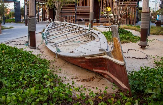 Boat on the La Mer beach in Jumeirah area, Dubai, UAE. Outdoors