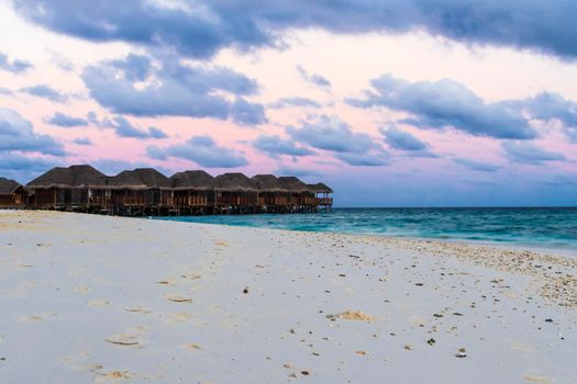 Shot of a over water bungalows on tropical island