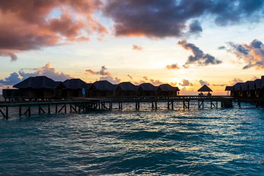 Shot of a over water bungalows on tropical island