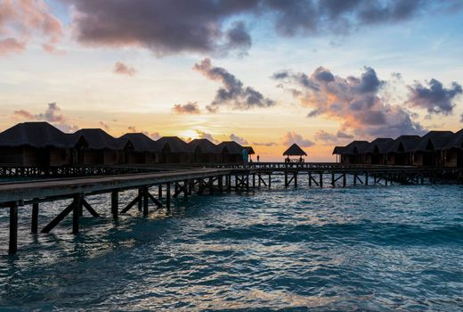 Shot of a over water bungalows on tropical island