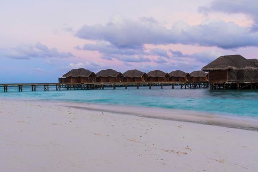 Shot of a over water bungalows on tropical island