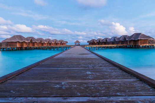 Shot of a over water bungalows on tropical island