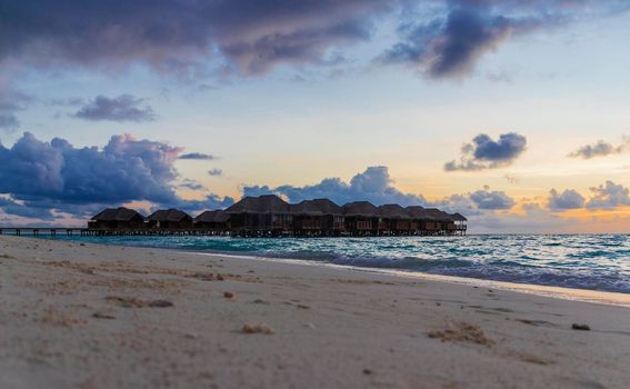 Shot of a over water bungalows on tropical island