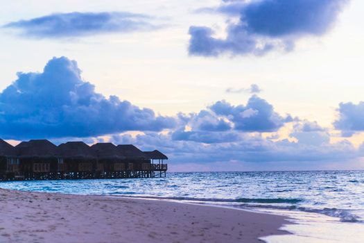 Shot of a over water bungalows on tropical island