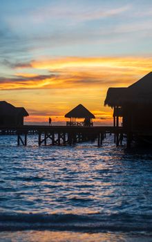 Shot of a over water bungalows on tropical island