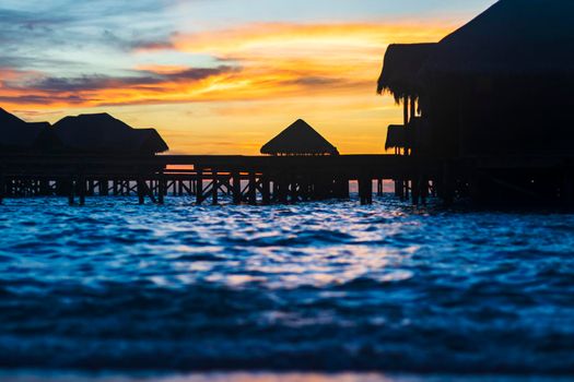 Shot of a over water bungalows on tropical island