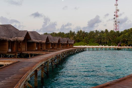 Shot of a over water bungalows on tropical island