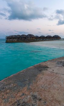 Shot of a over water bungalows on tropical island