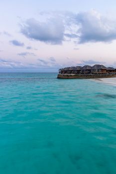 Shot of a over water bungalows on tropical island
