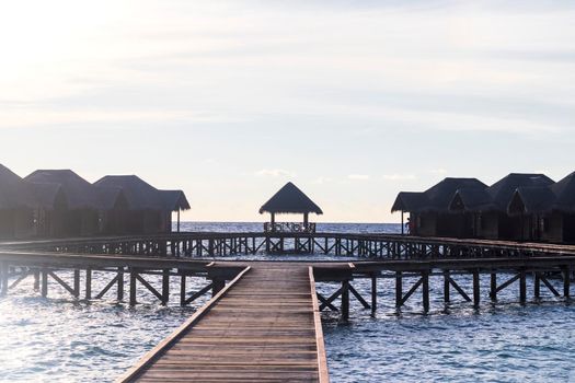 Shot of a over water bungalows on tropical island