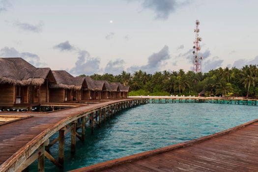 Shot of a over water bungalows on tropical island