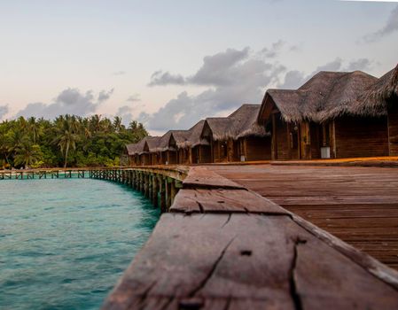 Shot of a over water bungalows on tropical island