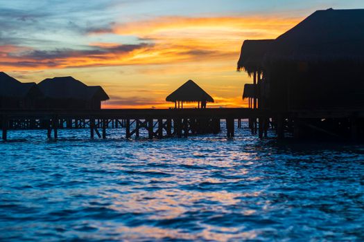 Shot of a over water bungalows on tropical island