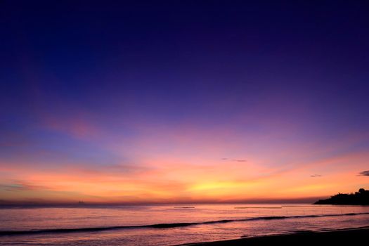 photograph of the sunrise from the sea and the beautiful sky and morning clouds