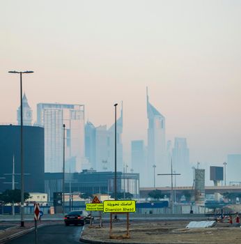 Dubai, UAE - 01.15.2021 Cityscape rising from the fog